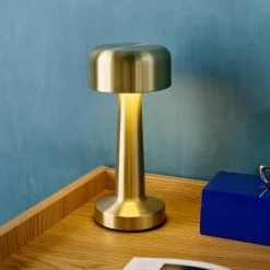 Candeeiro de mesa LED em metal dourado
