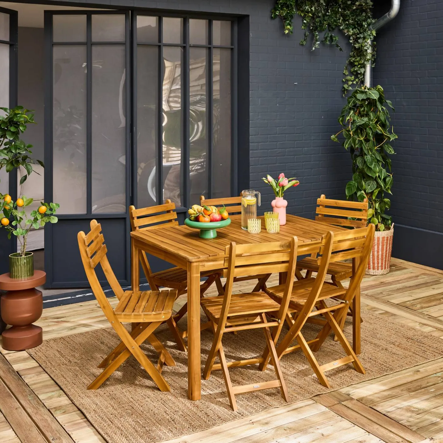 Conjunto de jardim com mesa em madeira de acácia com cantos arredondados com 6 cadeiras