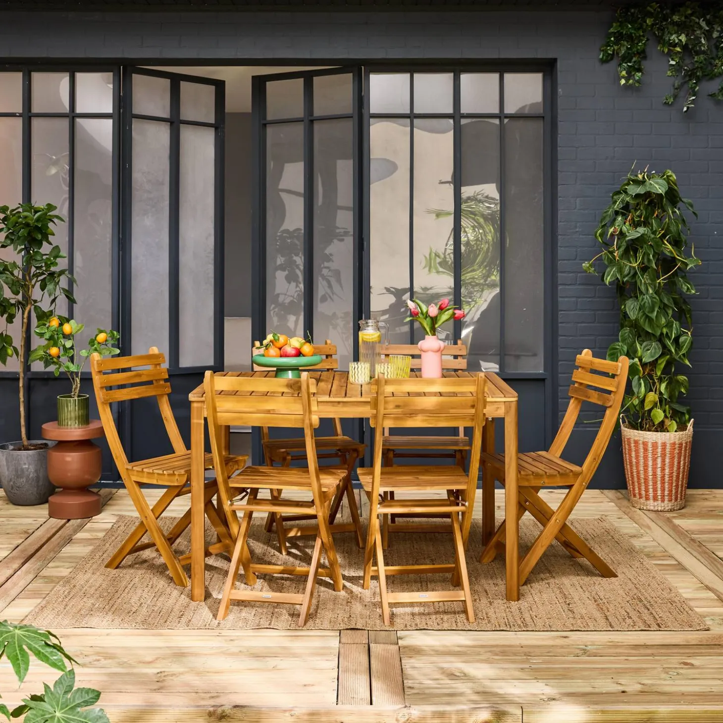 Conjunto de jardim com mesa em madeira de acácia com cantos arredondados com 6 cadeiras