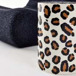 Mesa de apoio em aço esmaltado de padrão leopardo