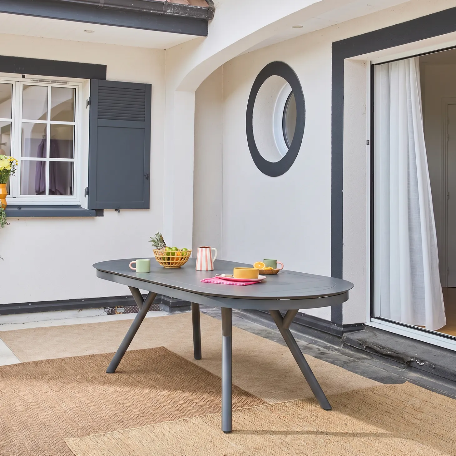 Mesa de jardim oval extensível em alumínio para 10 lugares