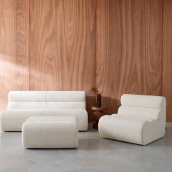 Sofá modular com apoio para os pés em tecido bouclé, 3 lugares