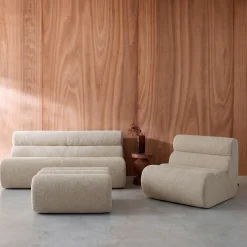 Sofá modular com apoio para os pés em tecido bouclé, 3 lugares