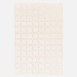 Tapete de interior com padrão gráfico creme