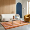 Tapete interior com riscas laranja e rosa