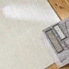 Tapete interior em veludo boucle creme