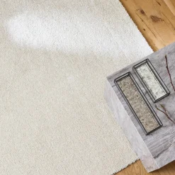 Tapete interior em veludo boucle creme