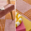 Tapete interior xadrez laranja e rosa